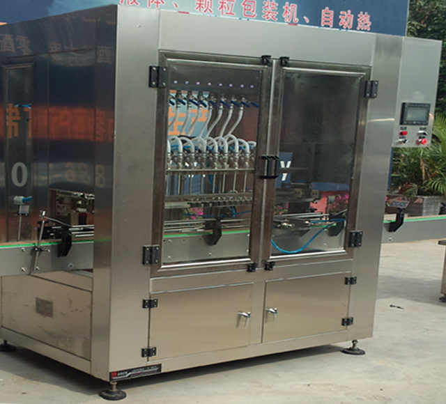 Linear filling machine with 4 filling heads เครื่องบรรจุเชิงเส้น.jpg