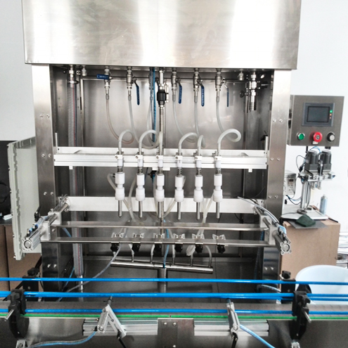 6 heads overflow filling machine เครื่องบรรจุน้ำล้น.jpg