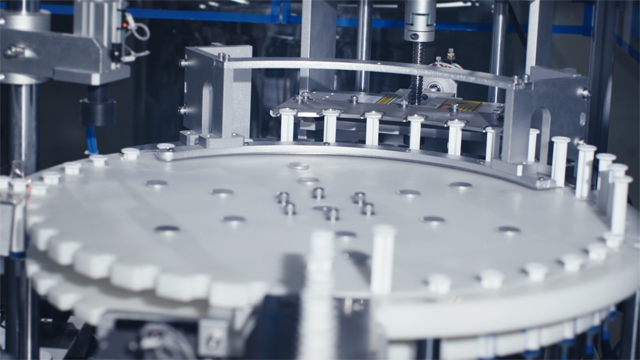 เครื่องปิดฝาด้วยเข็มฉีดยา