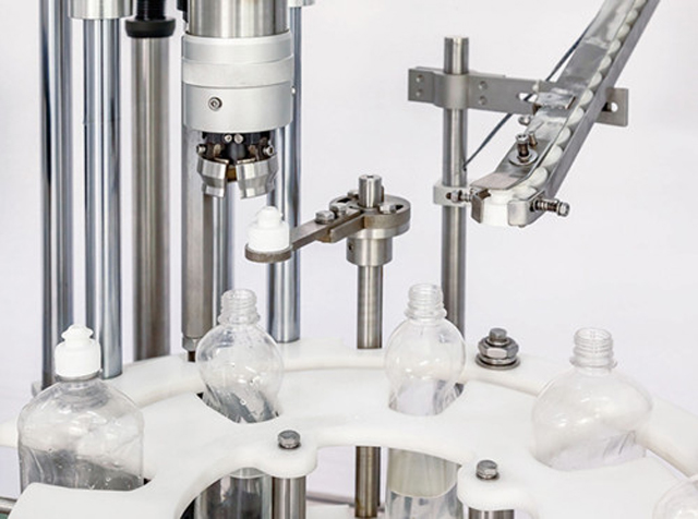 capping head close shot รายละเอียดของเครื่องปิดฝาเดี่ยว.jpg