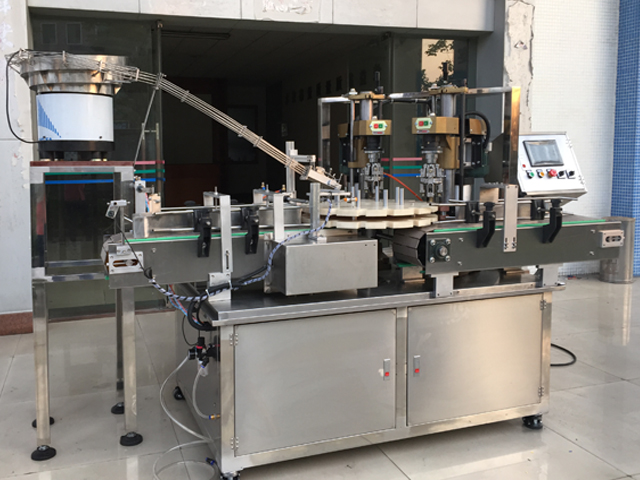 capping machine with 2 capping heads อุปกรณ์ปิดฝาเกลียวกึ่งอัตโนมัติ.jpg
