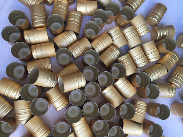 caps samples sent from usa customer for capping machine ฝาอลูมิเนียม.jpg