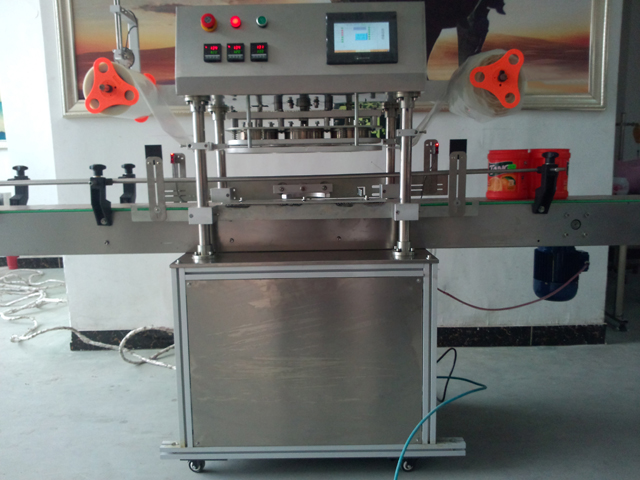 automatic three heads jars sealing equipment เครื่องปิดฝาขวดโหล.jpg