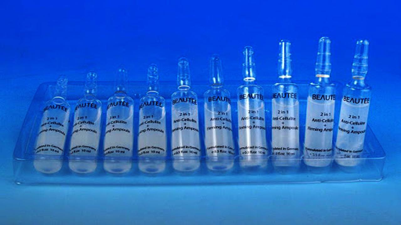 liquid solution bottles labeling machine samples final products ขวดแอมเพิล.jpg