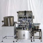 เครื่องบรรจุและปิดฝาขวดน้ำมันบำรุงผมแบบโมโนบล็อก