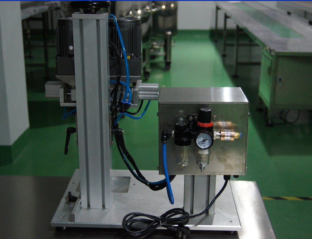 back shot of tabletop capping machine เครื่องปิดฝาแบบเกลียวตั้งโต๊ะ.jpg